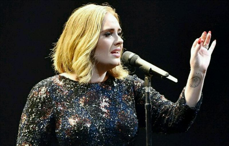 Pop Singer Adele pays tribute to Brussels terror attack victims at O2, London