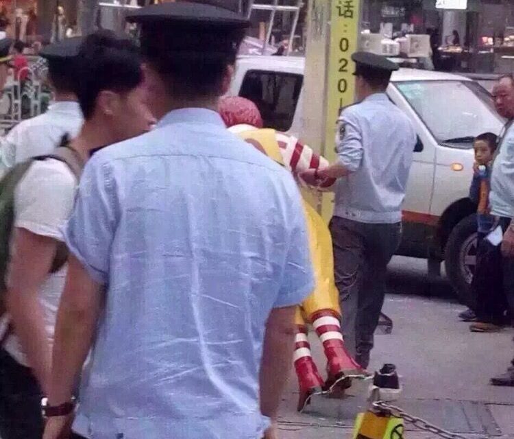 WTF: McDonald statue arrested for hindering traffic