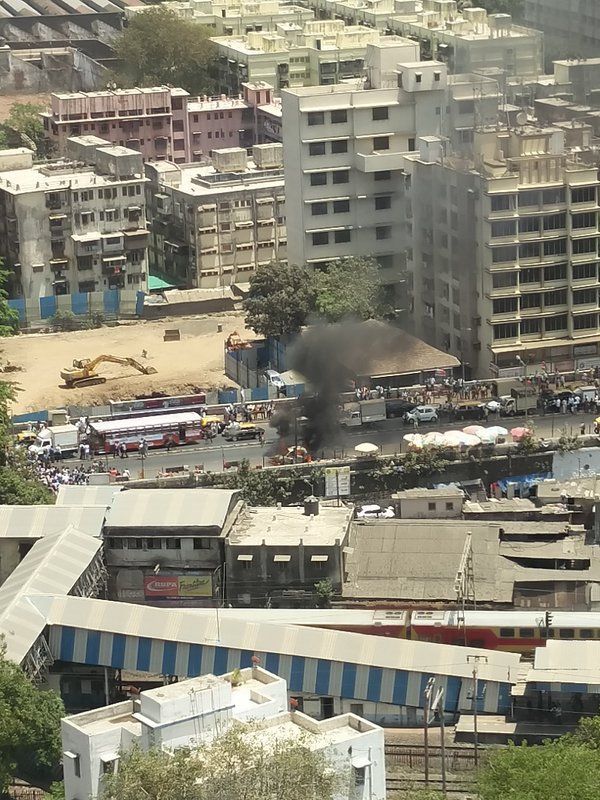 Car catches fire outside Lower Parel railway station