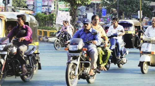 Pillion riders without helmets to be fined and lectured