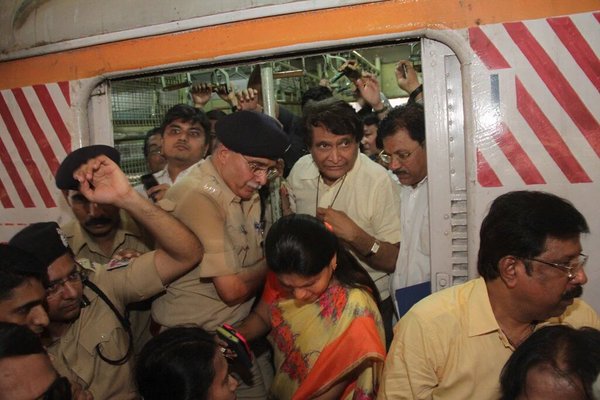 Railway Minister takes a local train ride from Currey Road to CST SY 1