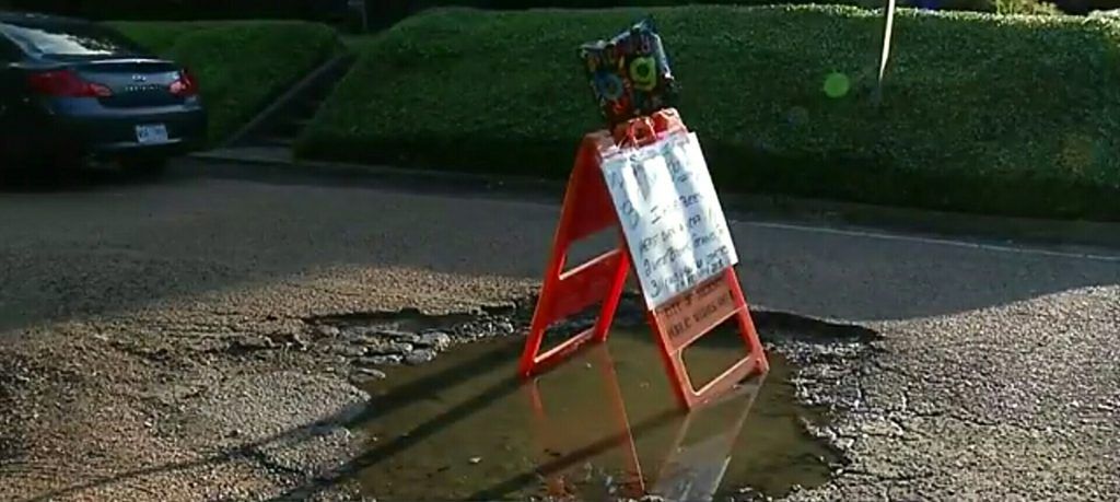WTF: Man throws birthday party for a pothole