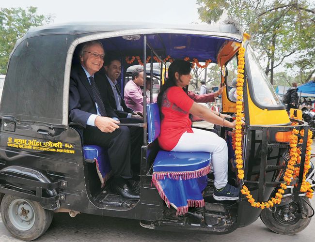 Women auto-drivers don't want 'orange' rickshaws