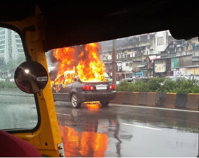 Car catches fire on Western Express Highway near Hub Mall, Goregaon