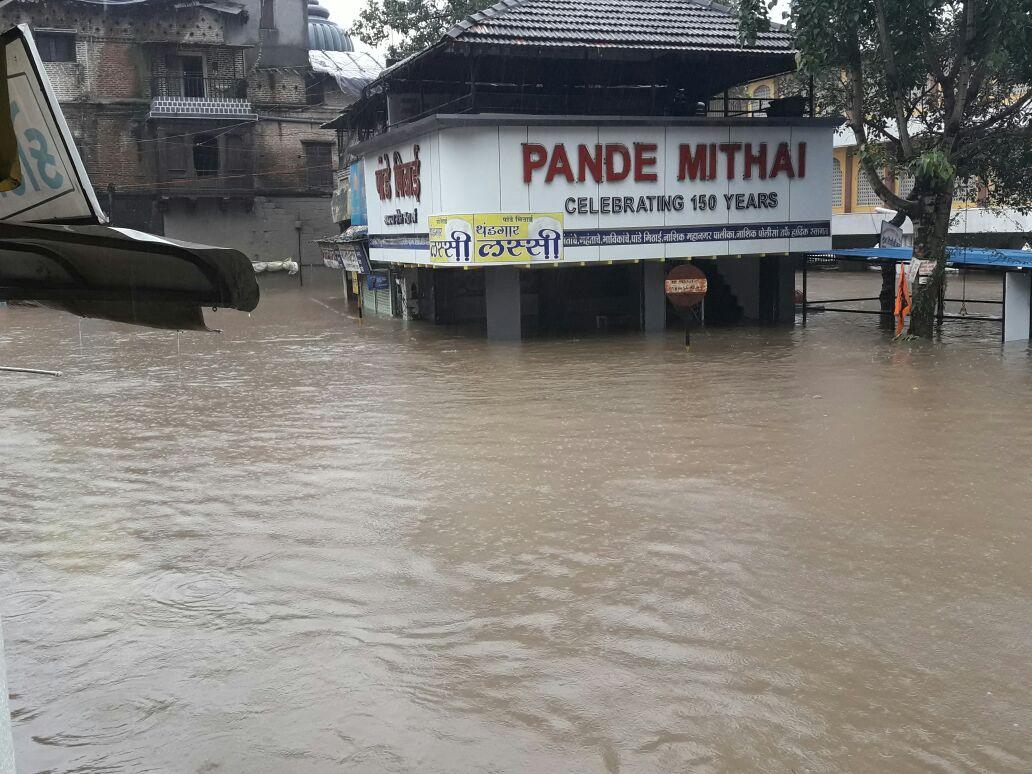 In Pictures: Nashik on high alert after heavy rainfall, social media flooded with imagesIn Pictures: Nashik on high alert after heavy rainfall, social media flooded with images 11