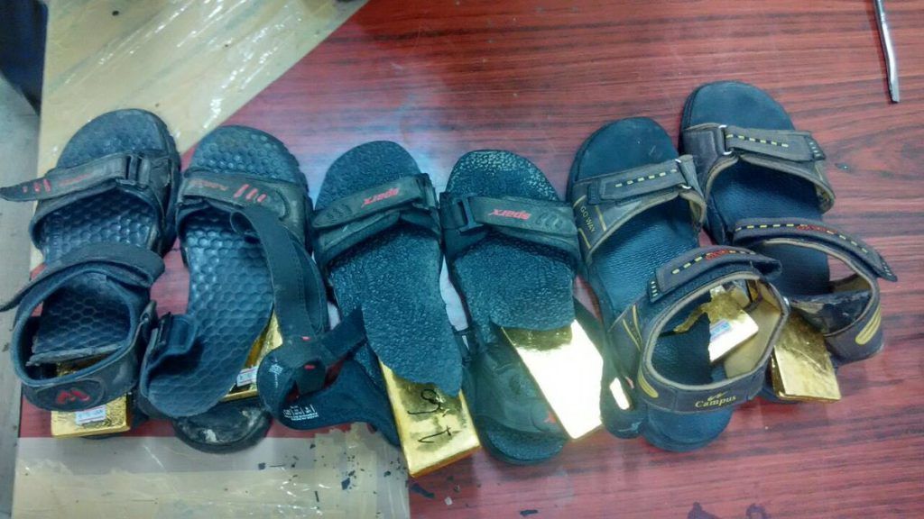 Gold bars weighing 28 kgs, worth Rs 8.3 crores found concealed in passengers’ sandals