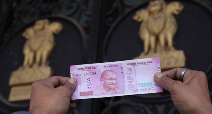 Rupee at an all-time low: Breaches 70-mark against US dollar for the first time